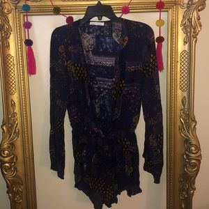 Honey punch romper. Size small. NWOT.